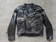 Vintage 1990s black WILSONS motorcycle jacket XL belted 46 punk BIKER mad max