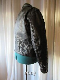 Vintage FIRST Genuine Leather Black Motorcycle biker jacket Sm/Med well worn in